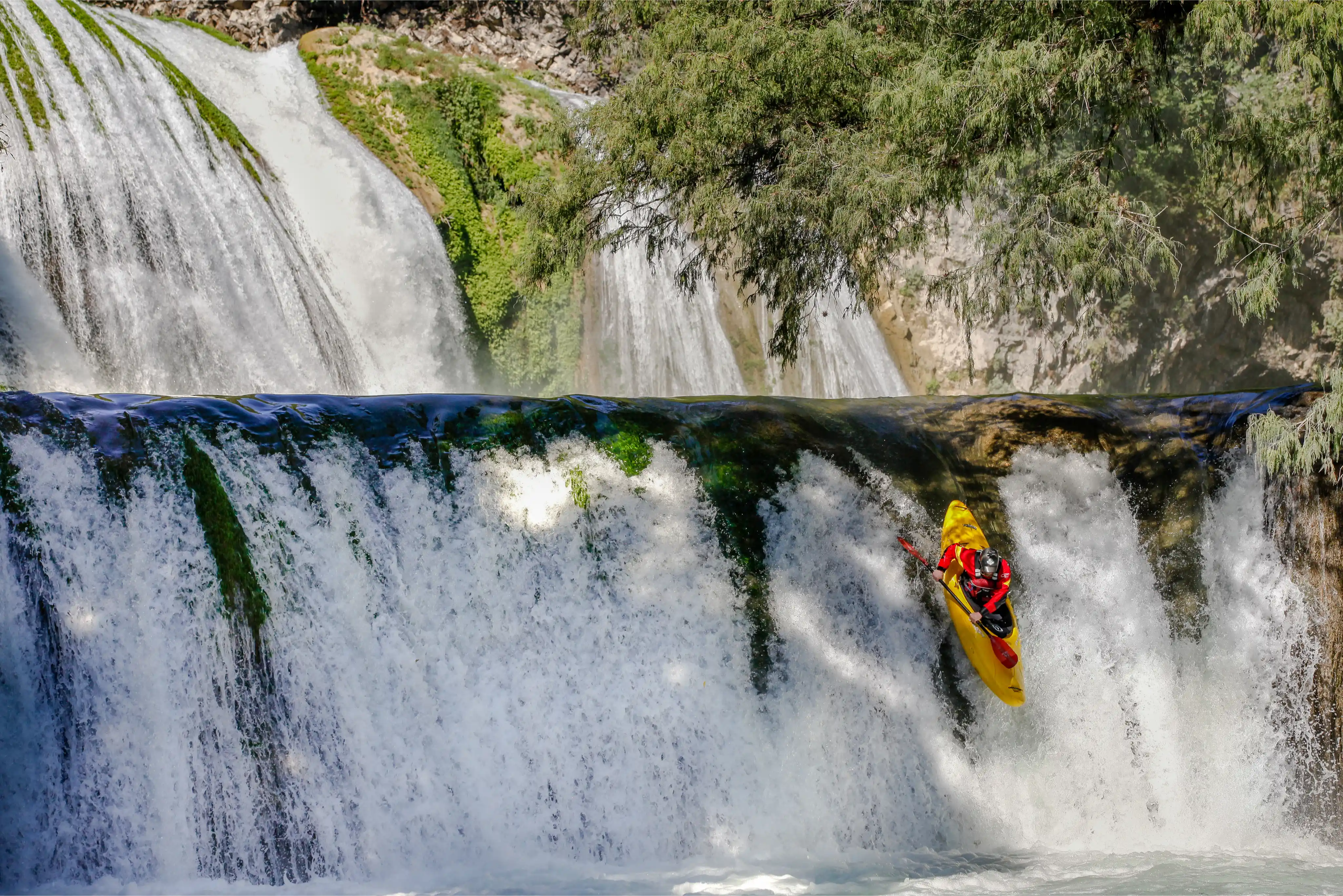 Kayaking down a waterfall with Alpin Kayak Academy